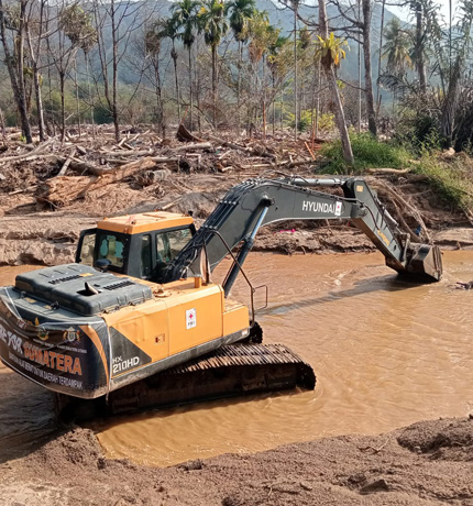 Hyundai and DEVELON construction equipment from HD Construction Equipment supporting recovery efforts in the flood-damaged areas of Sumatra, Indonesia.